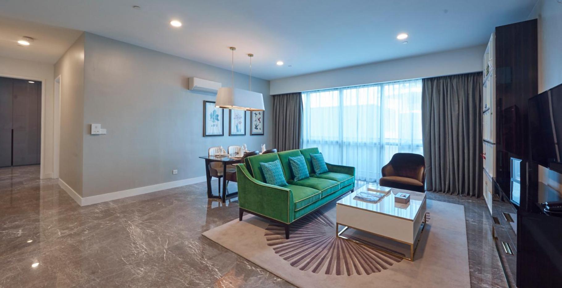 The Face Style Hotel كوالالمبور المظهر الخارجي الصورة A living room in a typical apartment